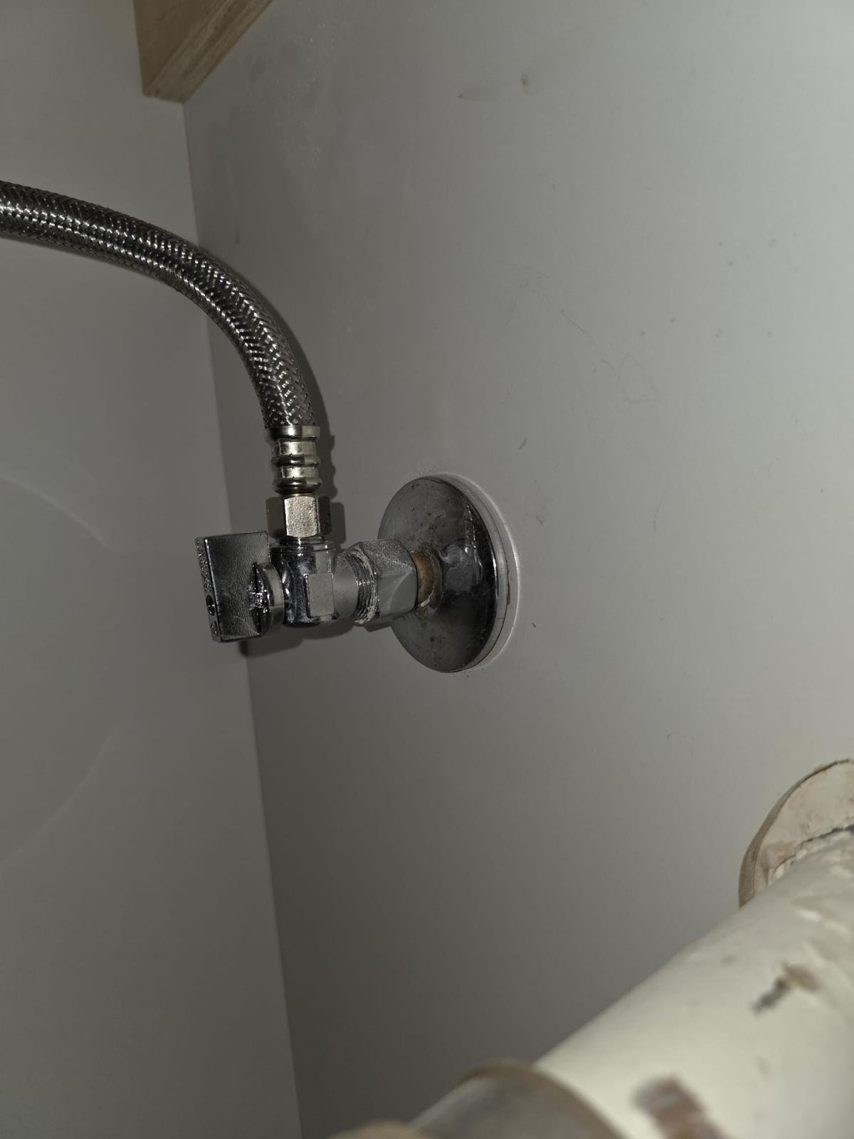 Client portfolio photograph of plumbing supply valves and pipes