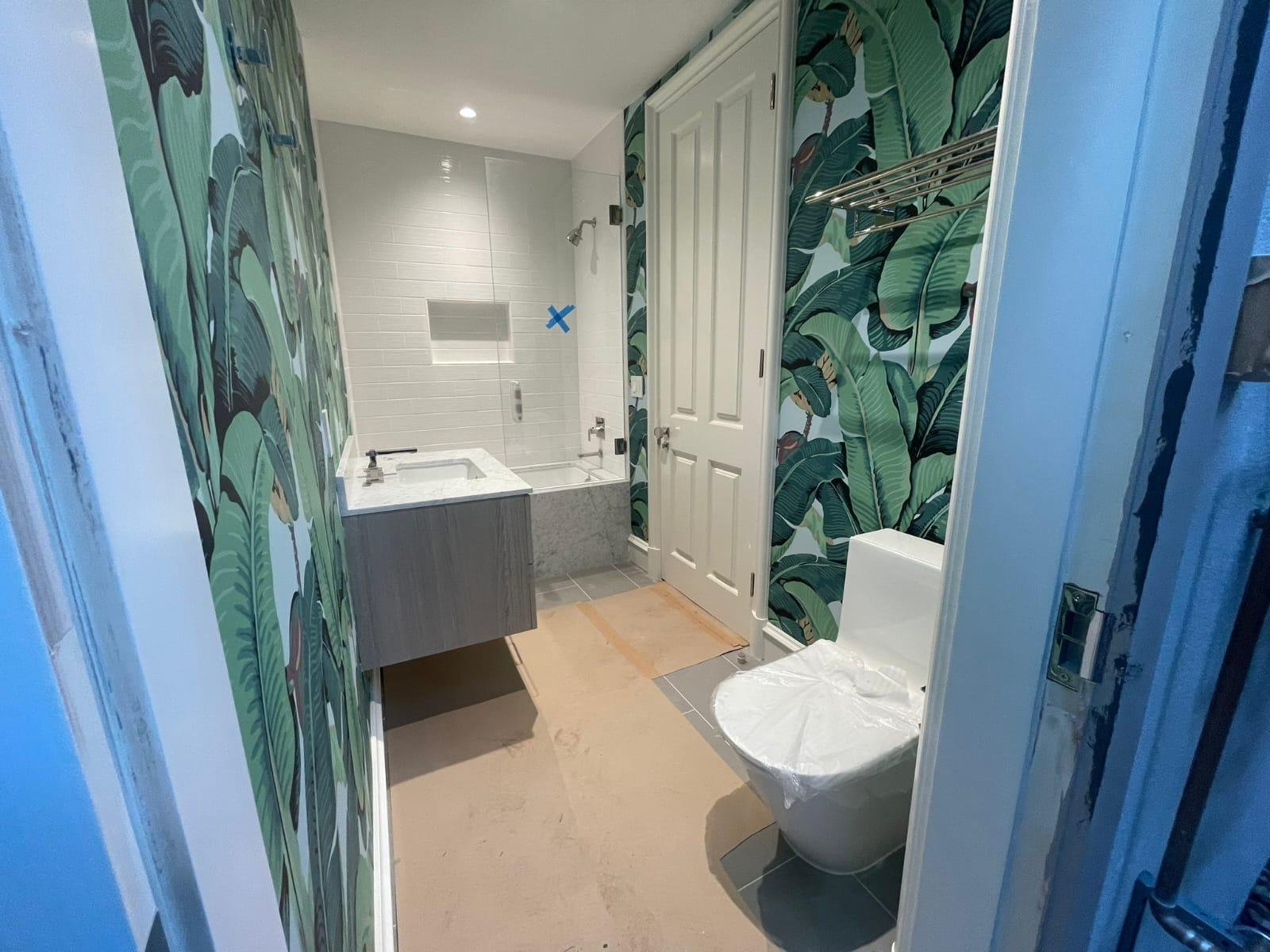 Client portfolio photograph of a completed bathroom with toilet